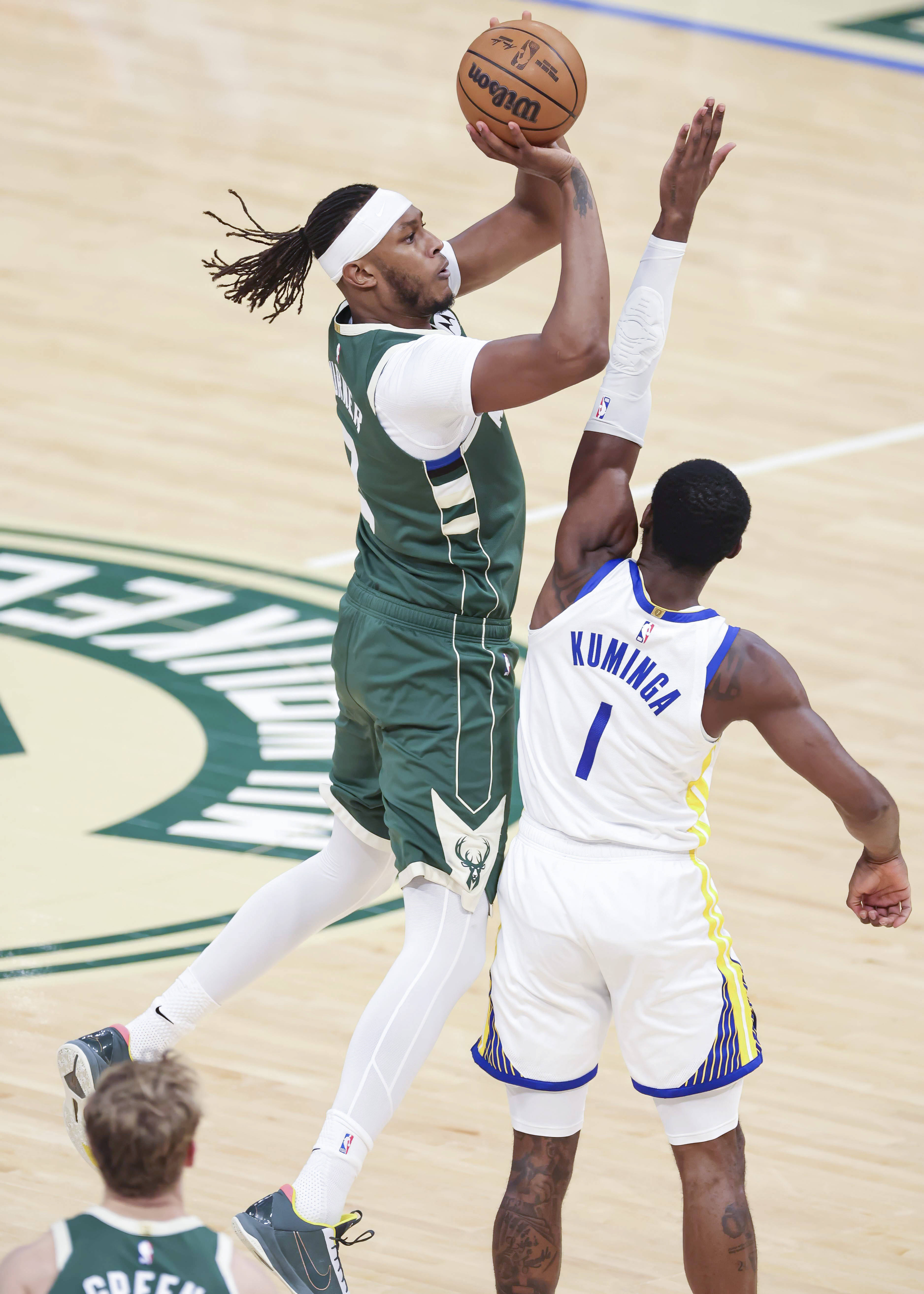 9you娱乐-勇士险胜雄鹿，约基奇状态火热